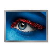 Designart 'Yüzünde Mavi Boya ve Kırmızı Toplarla Kadın Gözü' Modern Çerçeveli Sanat Baskısı